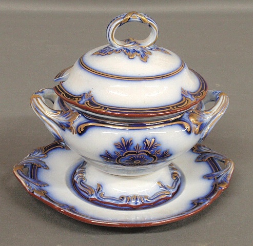 Appraisal: - Flow blue sauce tureen with gilt trim late th