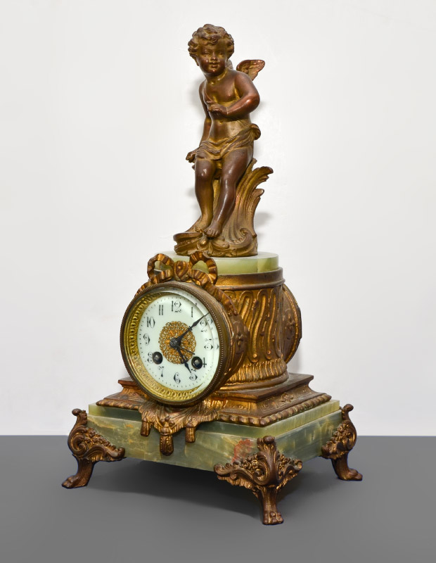 Appraisal: FIGURAL CHERUB AND ONYX FRENCH MANTLE CLOCK Gilt spelter figural