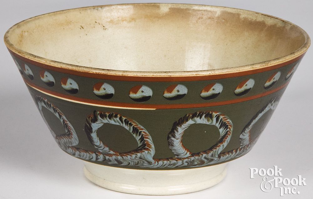 Appraisal: Mocha bowl Mocha bowl with cat's-eye and earthworm decoration h