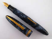 Appraisal: A Mentmore Celeste fountain pen in mottled blue side lever