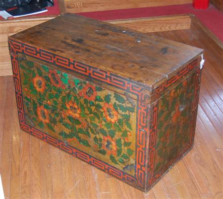 Appraisal: TIBETAN POLYCHROME AND GILDED TRUNK EARLY TH CENTURY the sides