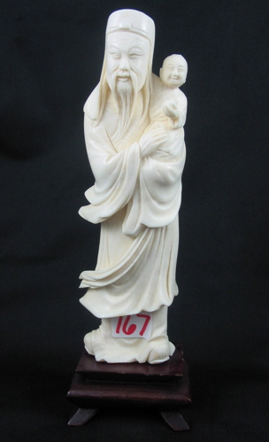 Appraisal: A CHINESE CARVED IVORY FIGURE of an older gentleman holding