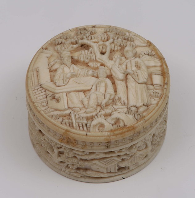 Appraisal: A Canton ivory carved circular patch boxthe cover having scholars