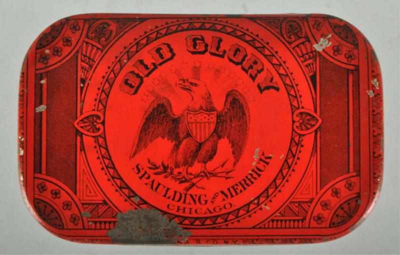 Appraisal: Old Glory Flat Pocket Tobacco Tin Description Great looking piece