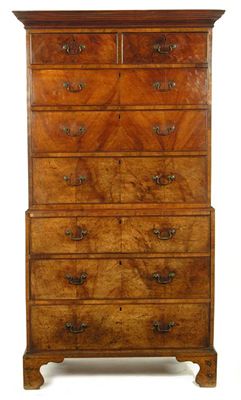 Appraisal: A th century walnut chest on chest the moulded edge