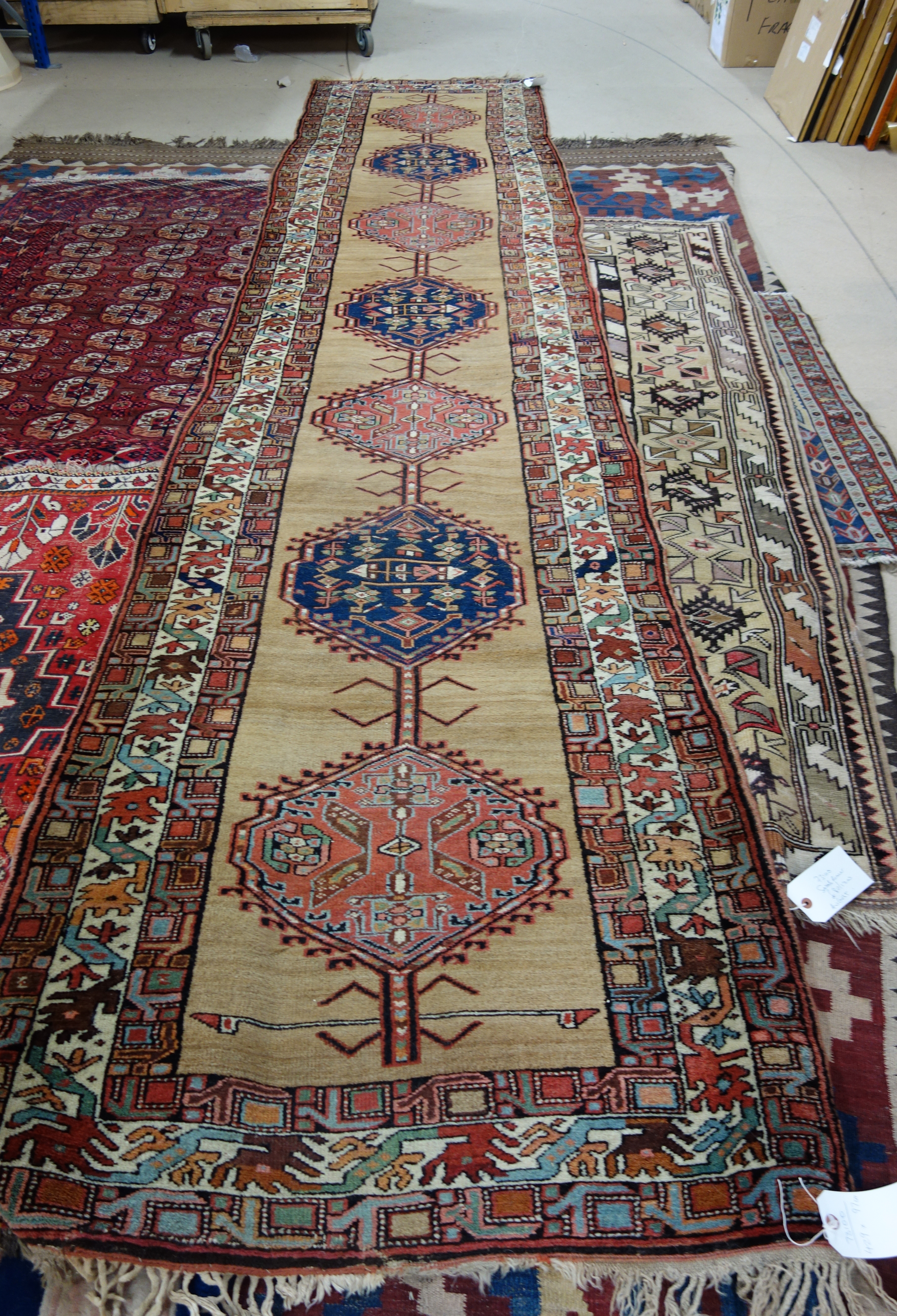 Appraisal: A Sarab runner Persian the camel field with seven medallions