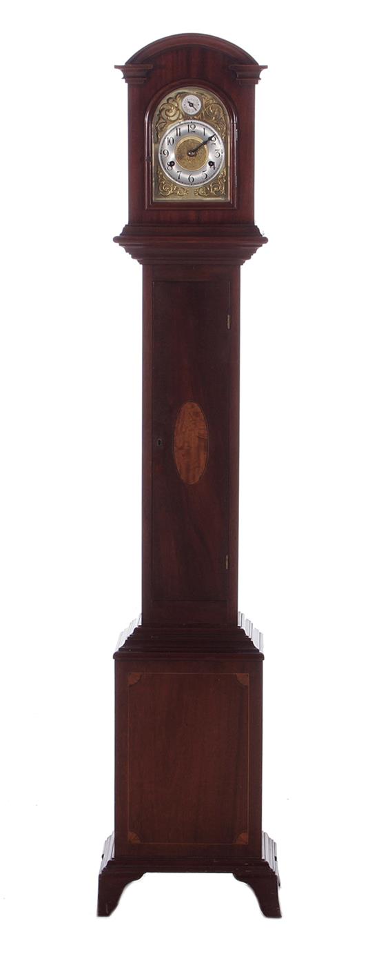 Appraisal: German mahogany grandmother clock brass dial arched crown inlaid door