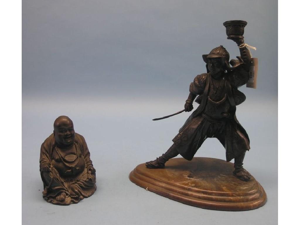 Appraisal: A bronzed metal figure of a Samurai warrior character clad