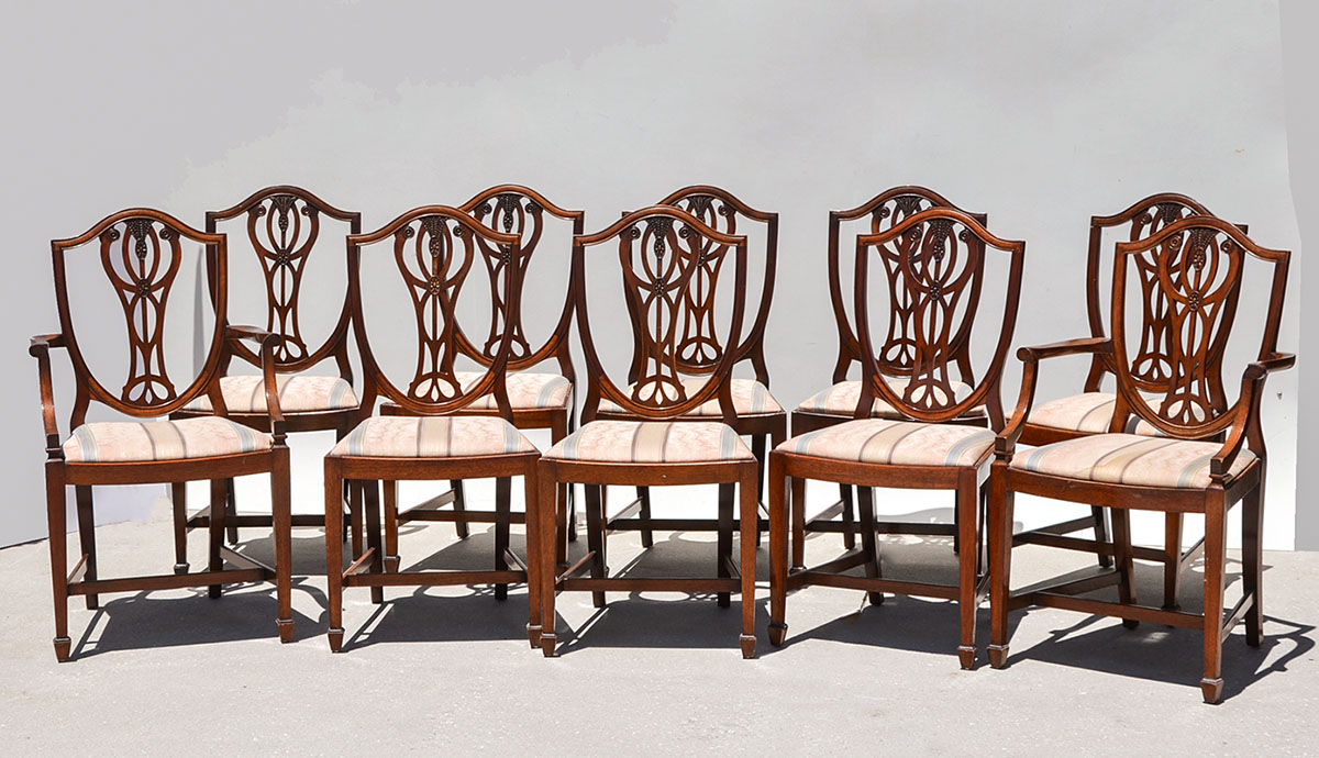 Appraisal: BERESFORD HICKS SHIELD BACK DINING CHAIRS Carved shield backs with