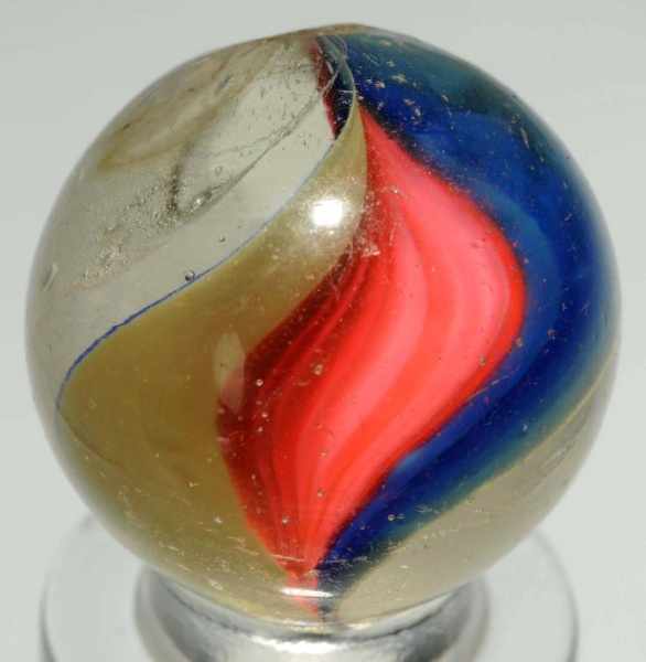 Appraisal: Single Ribbon Swirl Marble Description Pinkish red yellow and navy