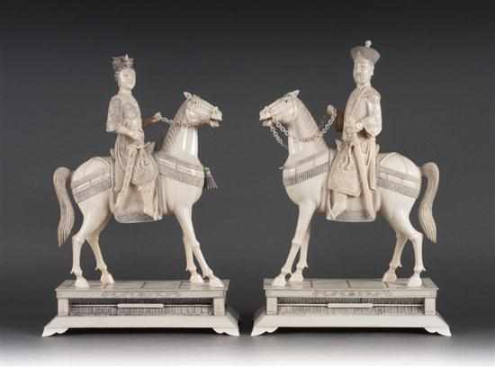 Appraisal: Pair of Chinese carved ivory equestrian figures early th century