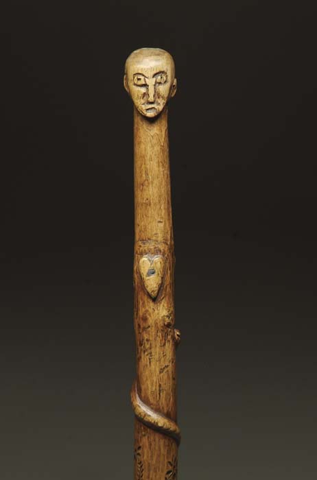 Appraisal: FOLK ART CARVED CANE The top portion of the wooden