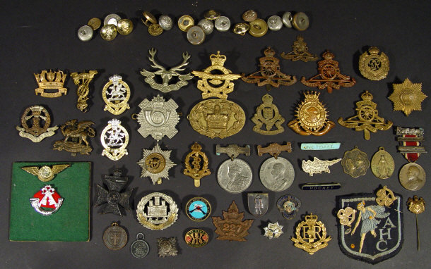 Appraisal: Collection of military cap badges buttons pins and a London