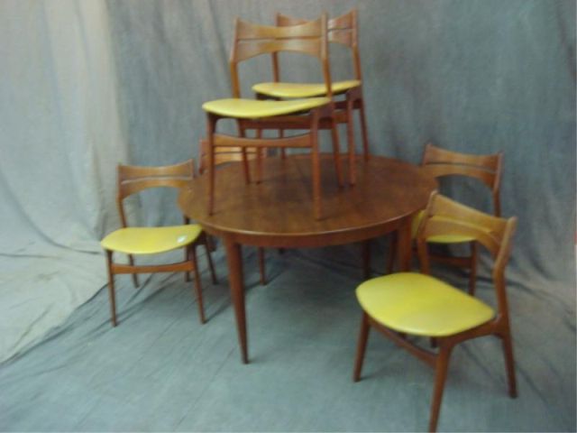 Appraisal: Danish Modern Table with Chairs diameter plus four leaves Midcentury