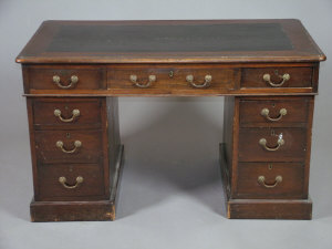 Appraisal: A mahogany pedestal desk th century the leather inset top