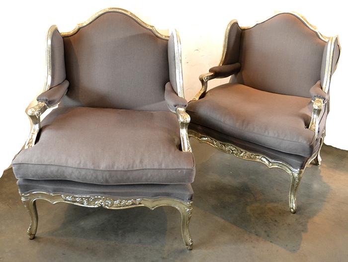 Appraisal: A PAIR OF GREY REPOUSSE SILVER METAL WINGBACK ARMCHAIRS WITH