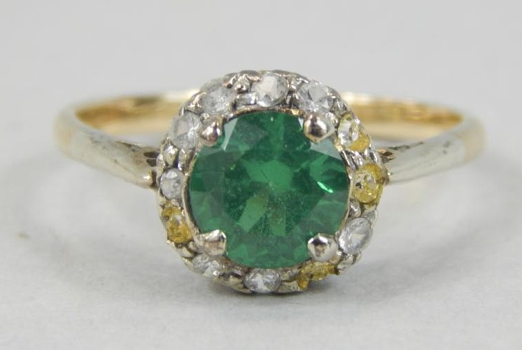 Appraisal: A dress ring green and white stones stamped c g