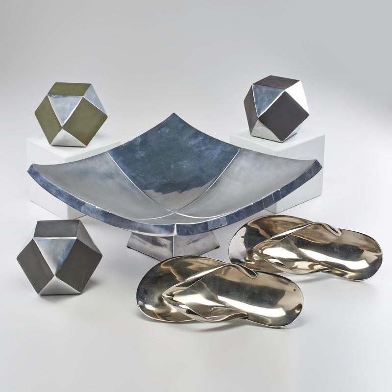 Appraisal: CONTEMPORARY Centerpiece bowl and three geometric forms Together with two