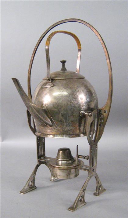 Appraisal: WMF Successionist silverplate kettle-on-stand circa With an angled openwork rattan