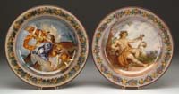 Appraisal: PAIR OF HAND PAINTED CHARGERS The round chargers have a