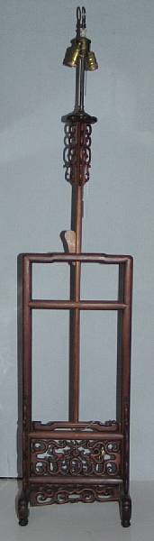 Appraisal: A hardwood hat stand th Century With carved details in