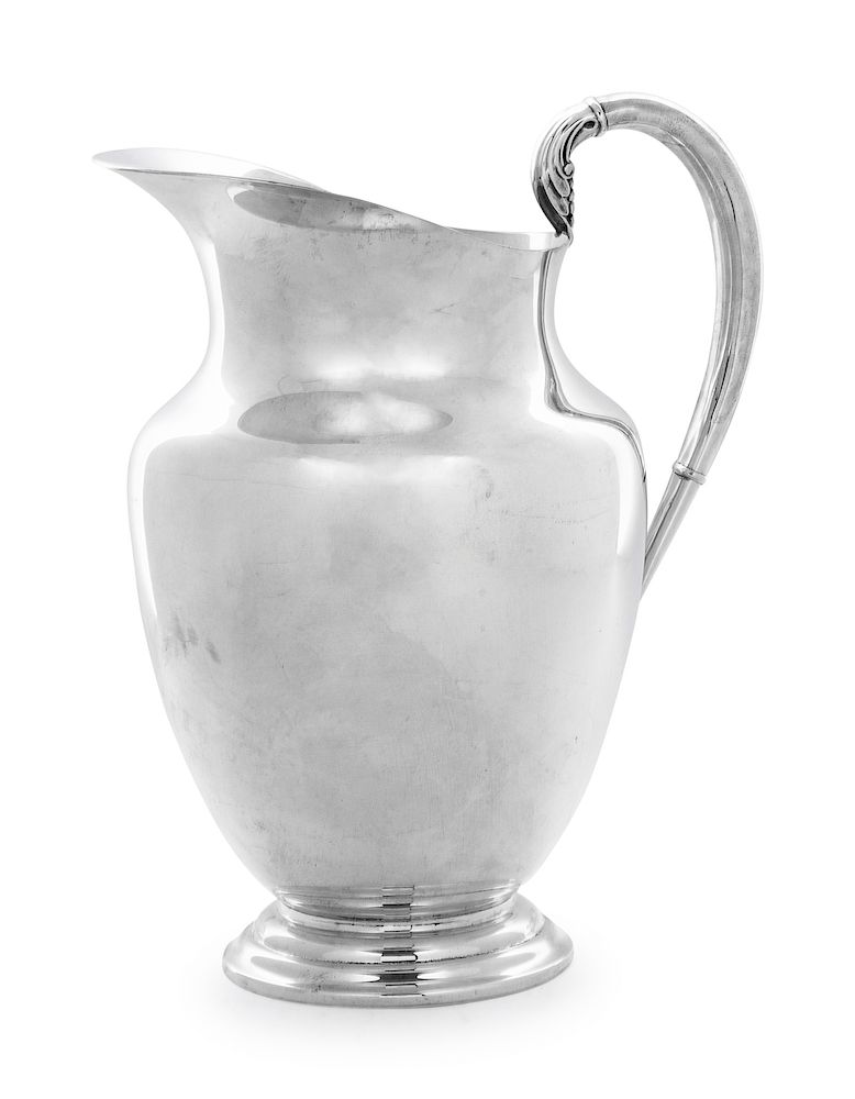 Appraisal: An American Silver Pitcher Rogers th Century with stepped foot