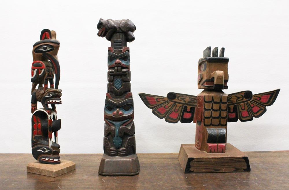 Appraisal: THREE ARTIST SIGNED TABLE TOP TOTEM POLES Philip Thorn '