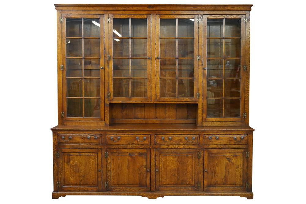 Appraisal: GEORGIAN STYLE HUTCH CABINEToak with brass hardware and a glass