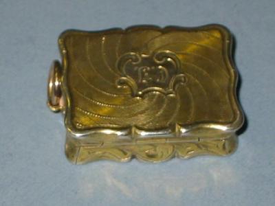 Appraisal: A VICTORIAN VINAIGRETTE of shaped oblong form with initialled cartouche