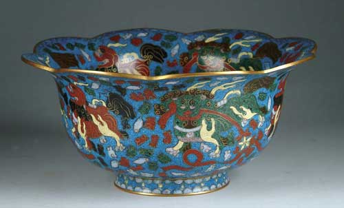 Appraisal: CLOISONN SHAPED FOOTED BOWL WITH ANIMALS Petal shaped rim and