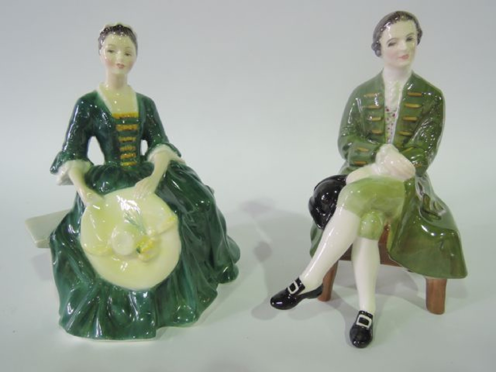 Appraisal: A pair of Royal Doulton figures a gentleman and a