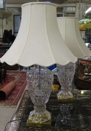 Appraisal: PAIR ENGRAVED CRYSTAL BASED TABLE LAMPS on brass finished metal