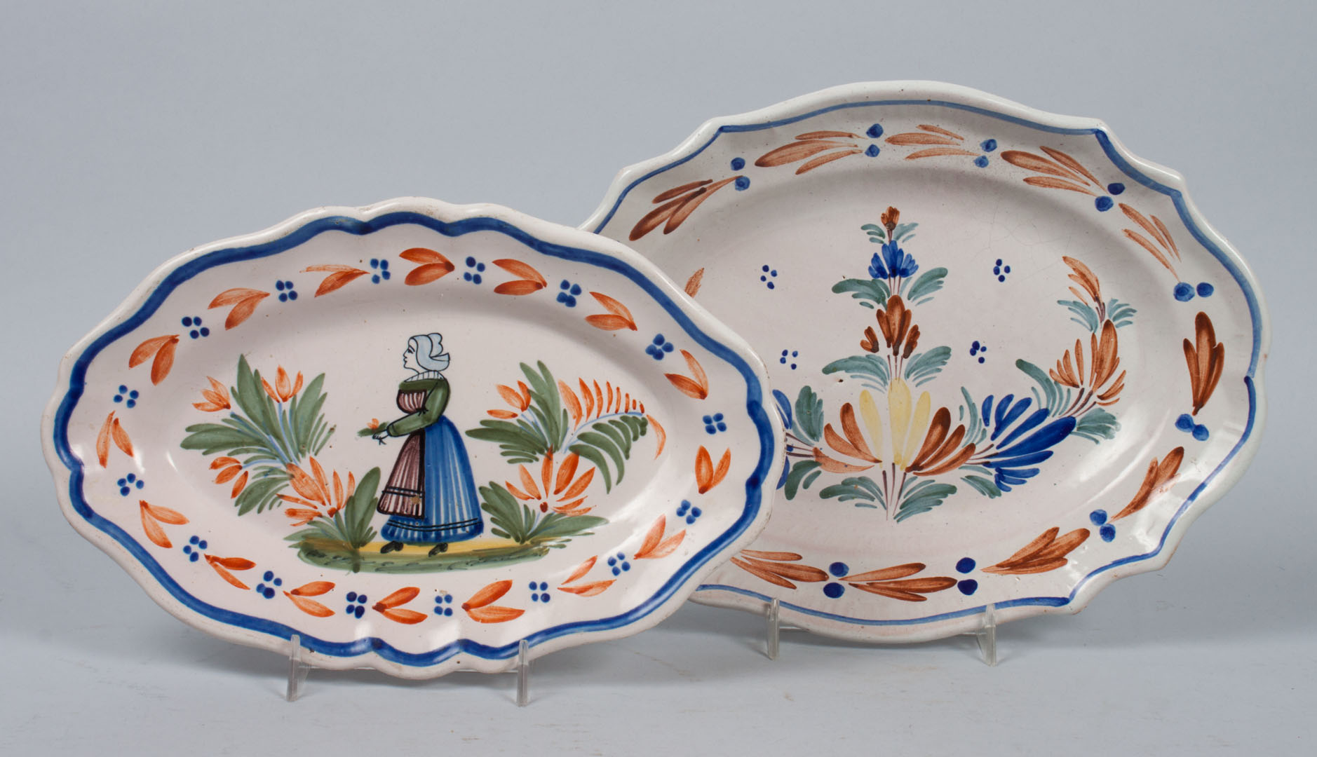 Appraisal: Two Quimper faience small platters smaller platter with flower and