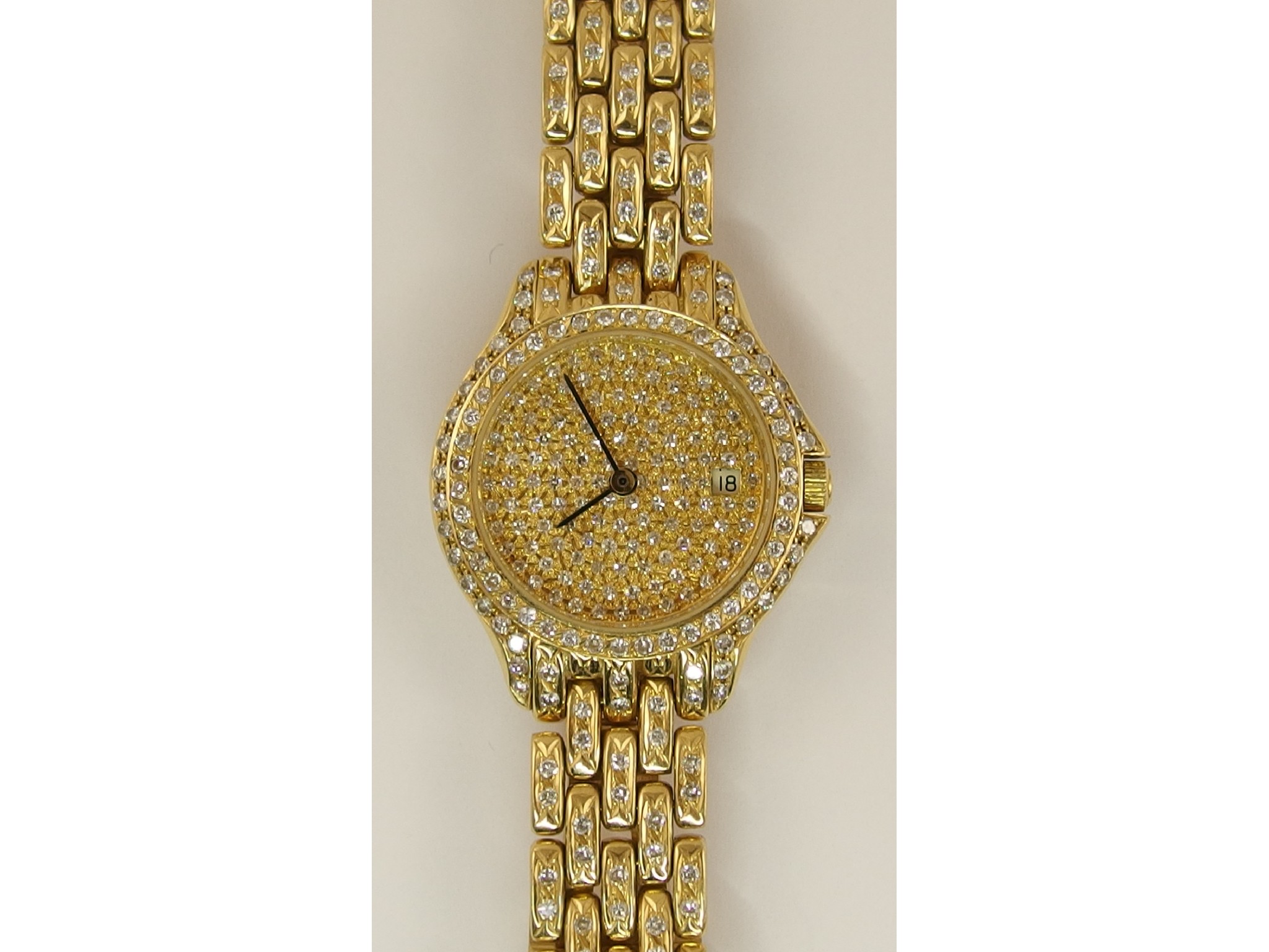 Appraisal: A ladies ct gold and diamond Omega date watchwith diamond