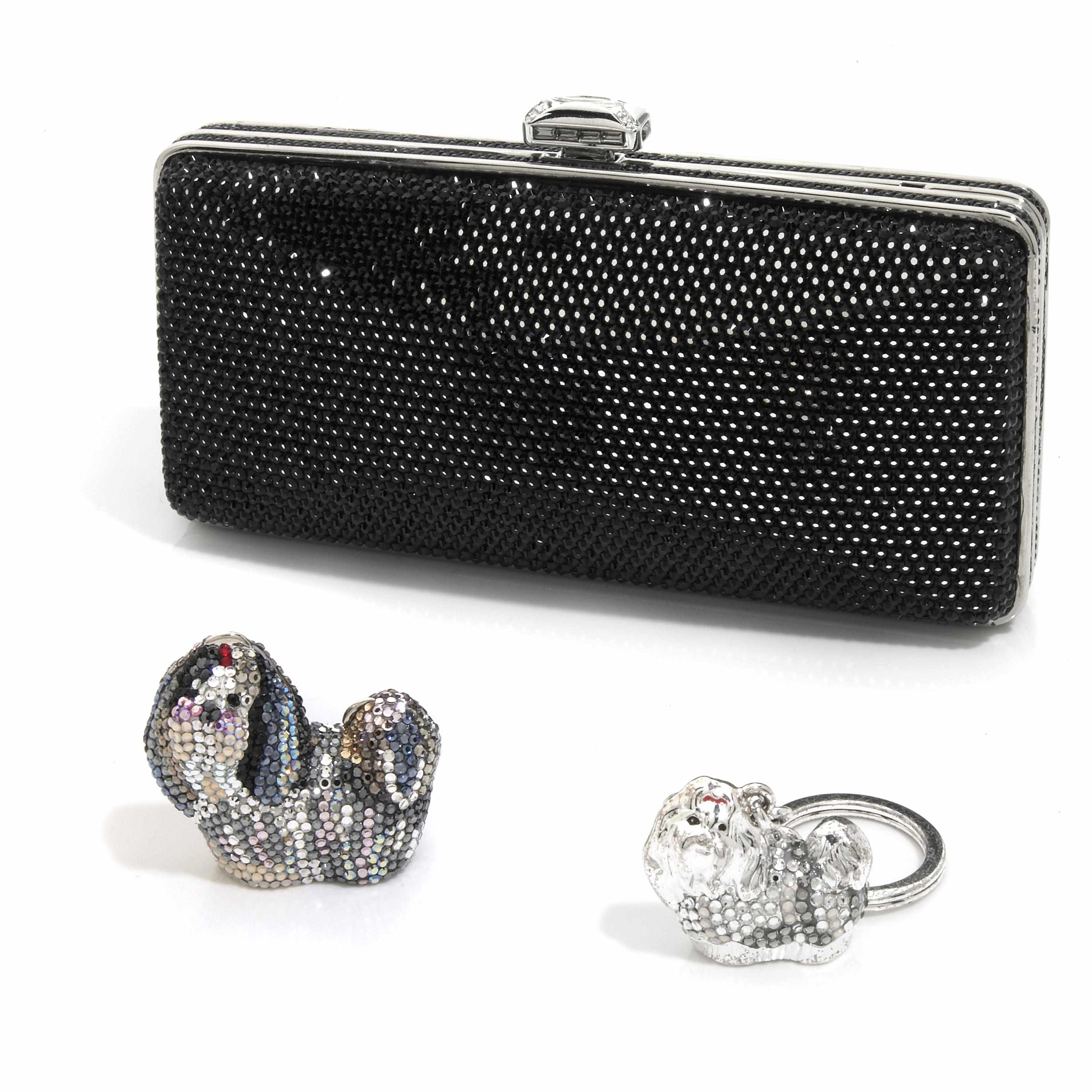 Appraisal: A rectangular black crystal purse with silver colored metal detailing