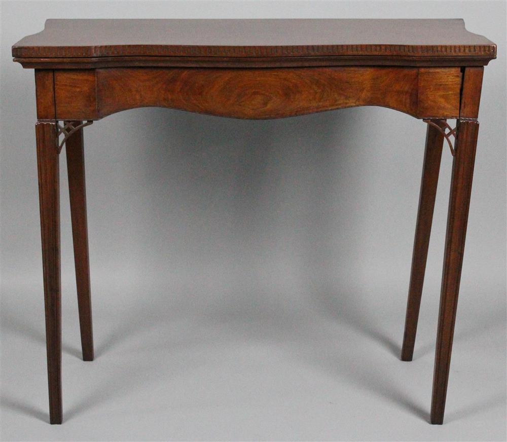 Appraisal: TRANSITIONAL FEDERAL CARVED MAHOGANY CARD TABLE having a shaped and