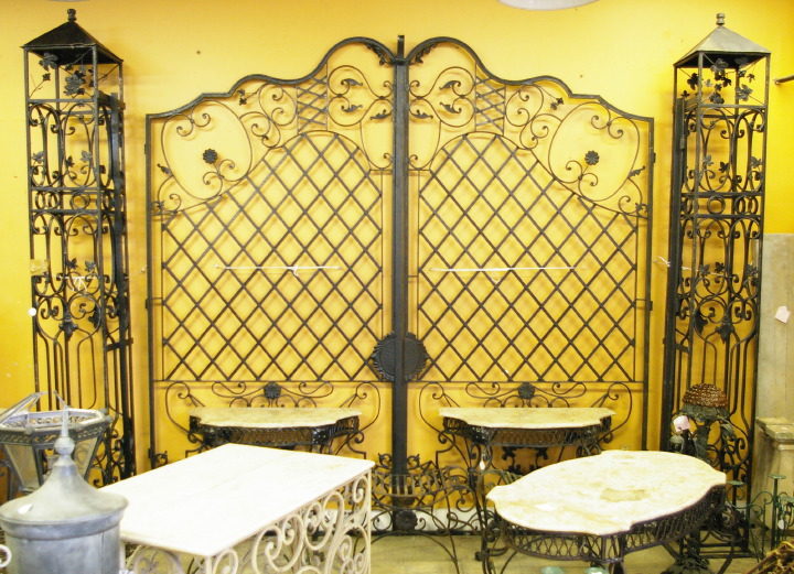 Appraisal: Pair of Monumental Mediterranean-Style Wrought-Iron Driveway Gates and Posts each