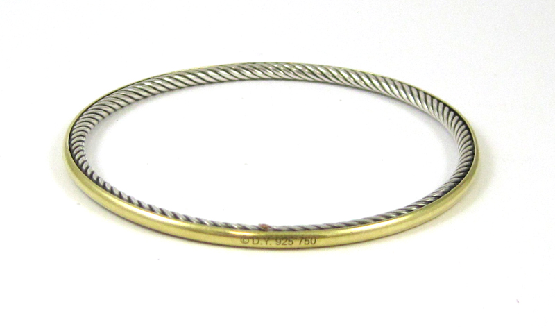 Appraisal: DAVID YURMAN YELLOW GOLD AND STERLING BANGLE The k yellow