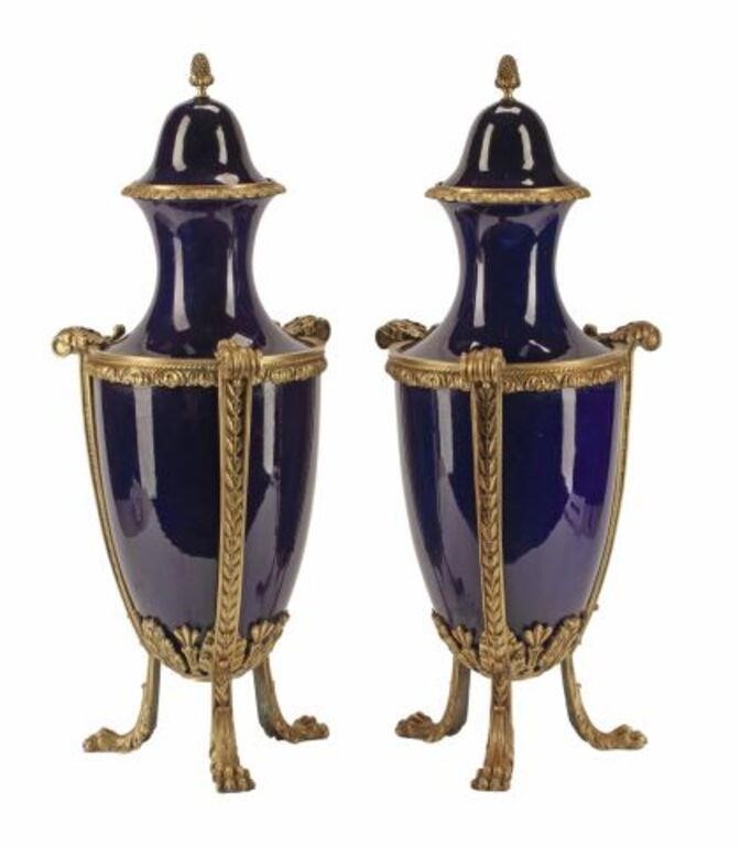 Appraisal: pair Sevres style porcelain covered vases cobalt-blue ground with bronze