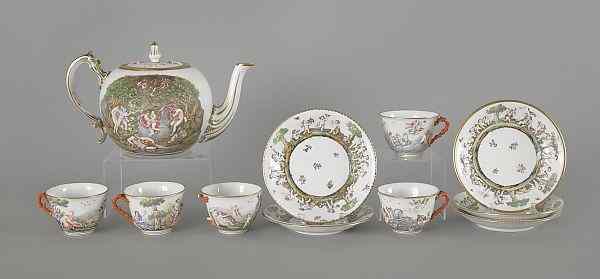 Appraisal: Capo di monte porcelain tea service with relief putti decoration