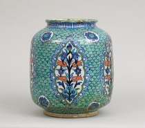 Appraisal: Iznik-Style Earthenware Vessel An earthenware vessel with straight sides and