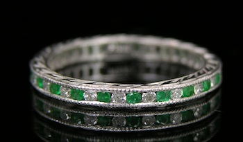 Appraisal: Platinum Diamond and Emerald Eternity Ring Platinum band setting features