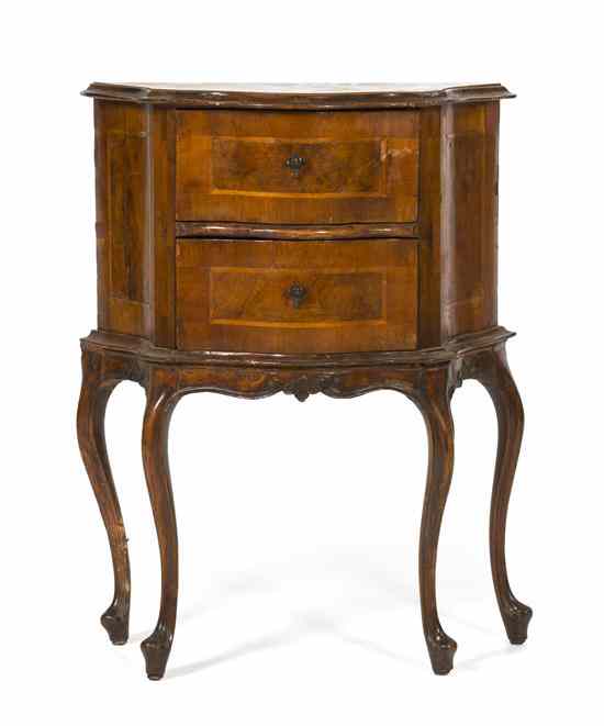 Appraisal: A Continental Burlwood Side Chest having a serpentine top over