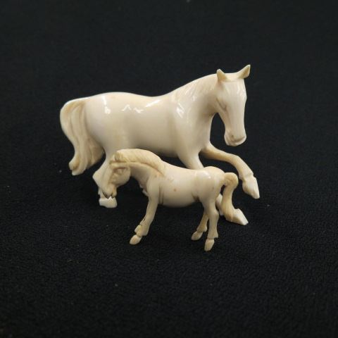 Appraisal: Carved Ivory Figurines Mare and Colt