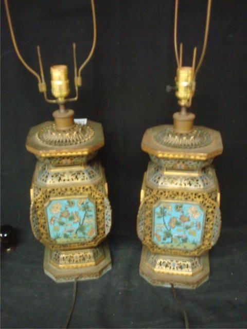 Appraisal: Pair of Asian Gilt Metal and Enameled Lamps From a