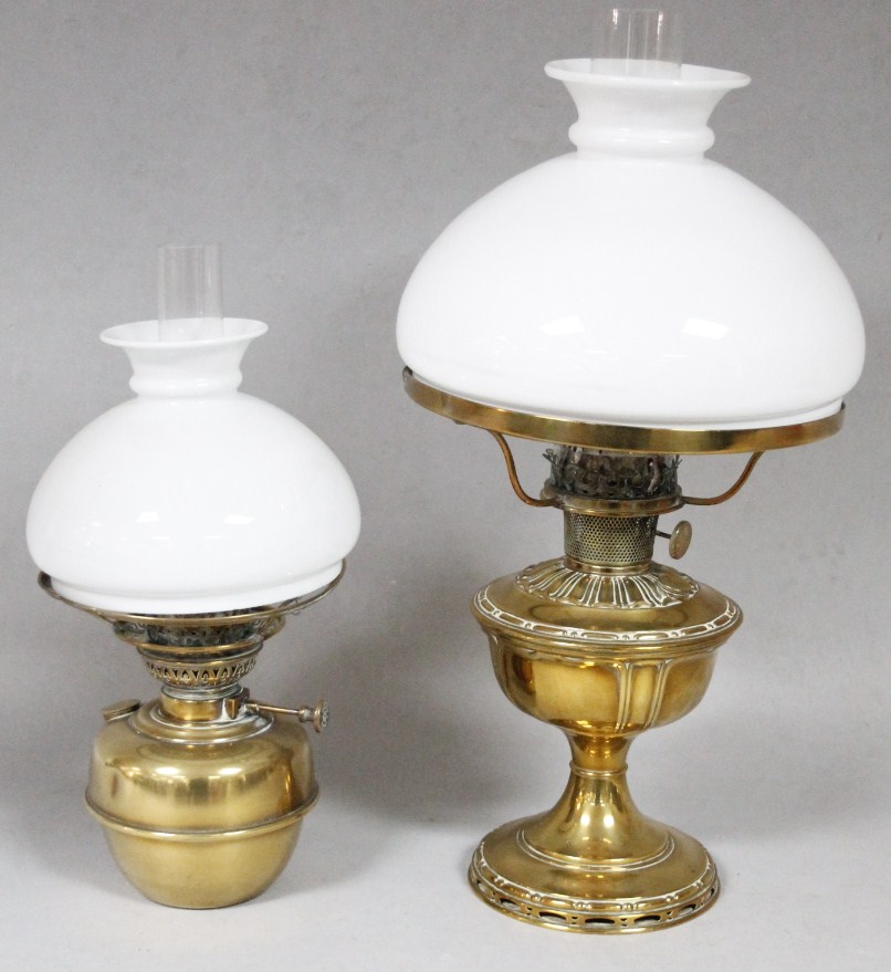 Appraisal: An early thC brass lamp with milk glass shade with