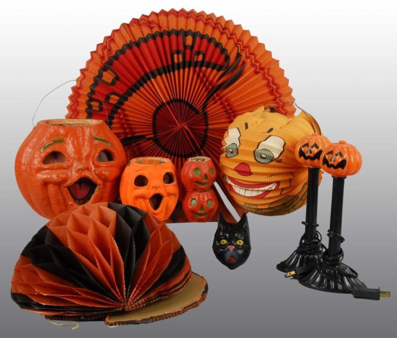 Appraisal: Lot of Halloween Pieces Description Includes some pulp Jack-O-Lanterns with