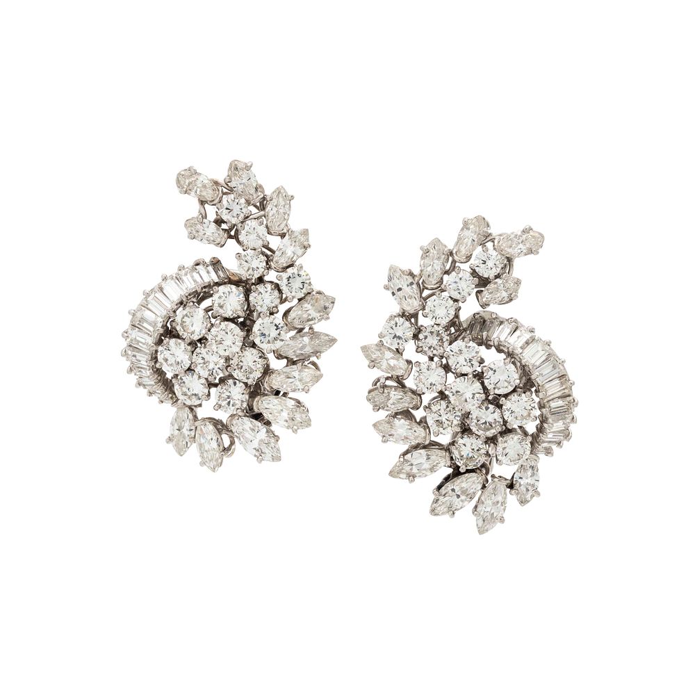 Appraisal: DIAMOND EARCLIPS DIAMOND EARCLIPS Containing marquise cut diamonds weighing approximately