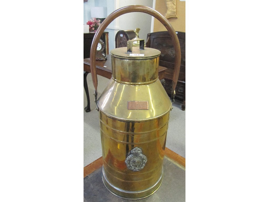 Appraisal: Brass two gallon flagon bearing military crest