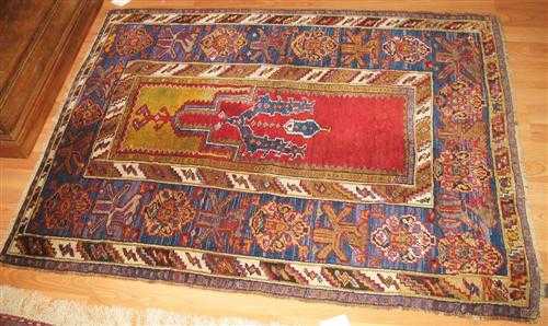 Appraisal: ANATOLIAN PRAYER antique Red mihrab with yellow spandrels broad border